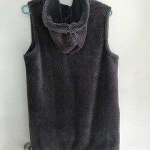 Fluffy hooded vest. Never worn.